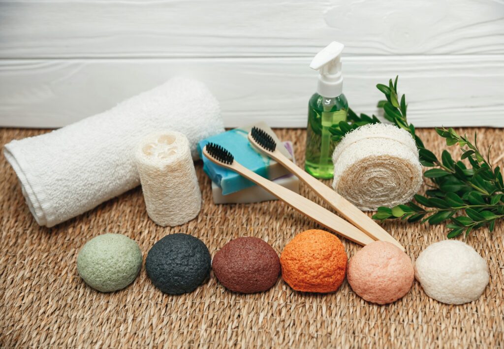 Handmade natural organic soap, toothbrushes, sponge and white towel