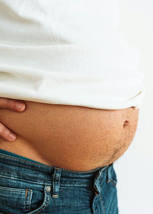 man in denim fat belly.