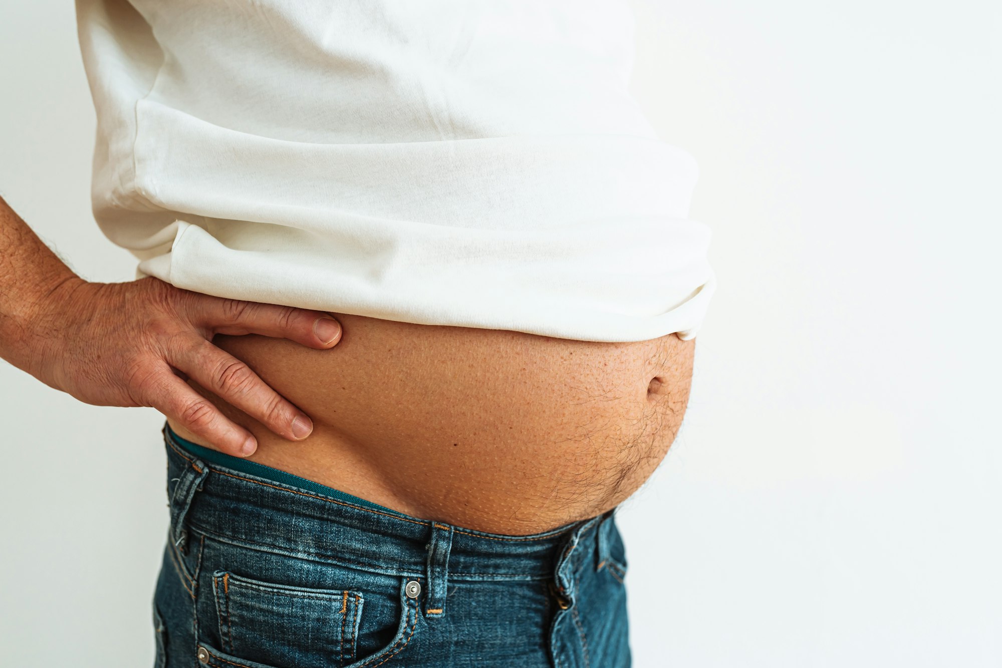 man in denim fat belly.